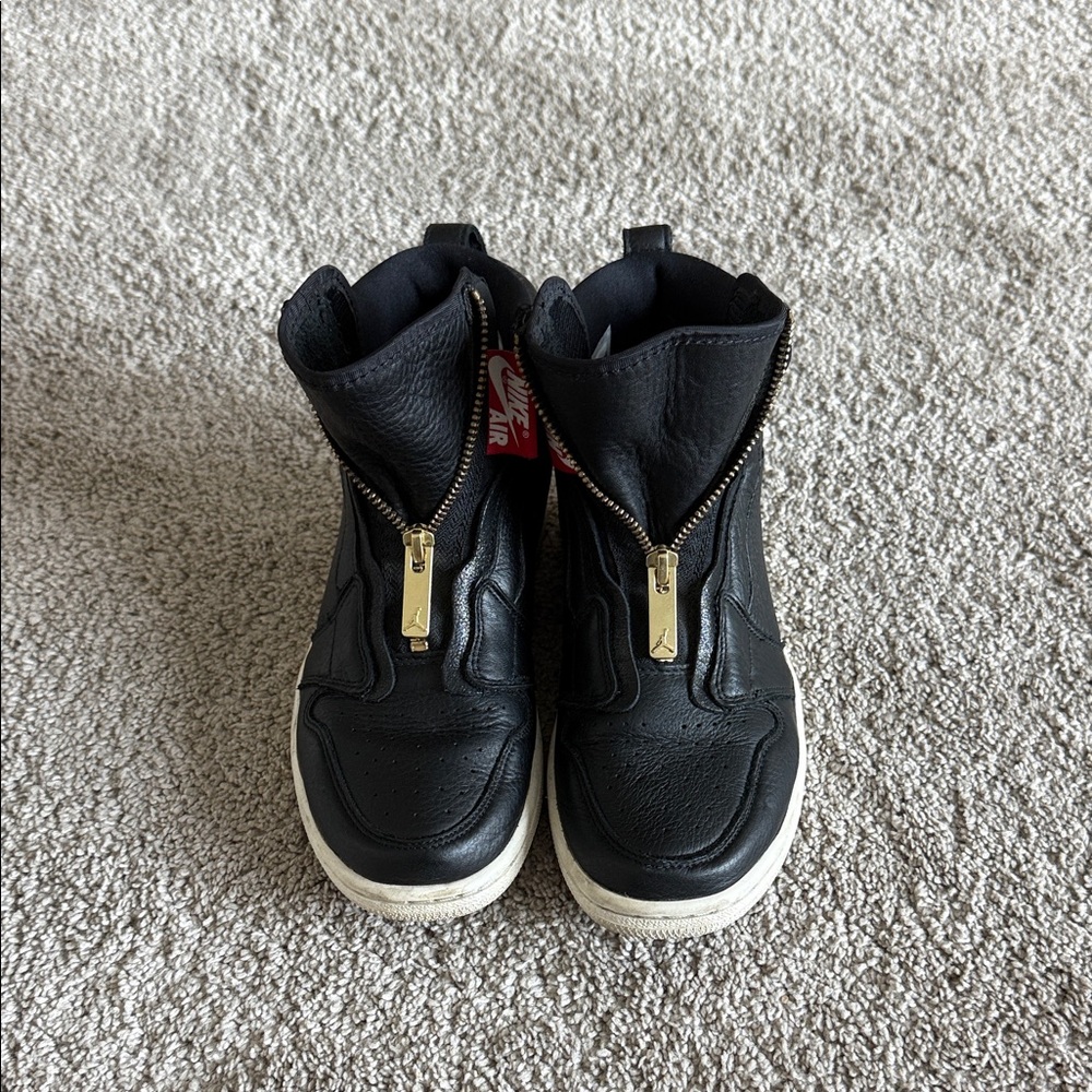 Nike Black Boots with Gold Accents